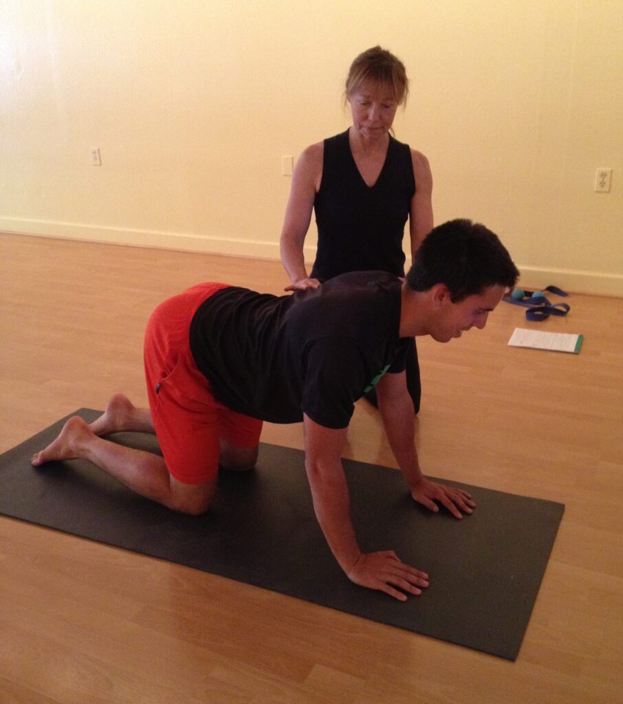 Audrey showing private student proper back alignment 